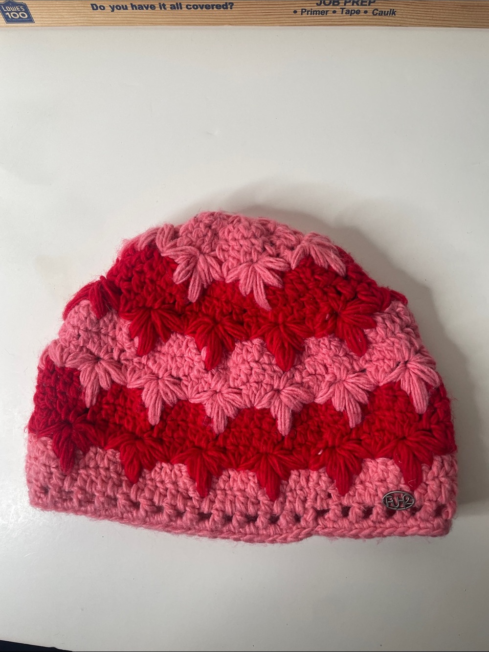 Fur headwear by Turtle fur Beanie crochet hat in red and pink